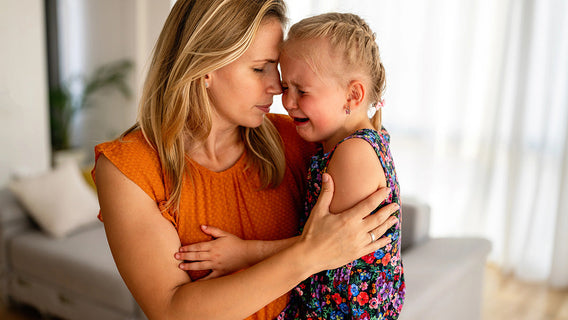 Mother being with child through difficult emotions